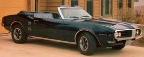 Some of the optional features available on the 1968 Pontiac Firebird Sprint convertible included a wood-trimmed steering wheel and red-striped tires. See more Pontiac Firebird pictures.