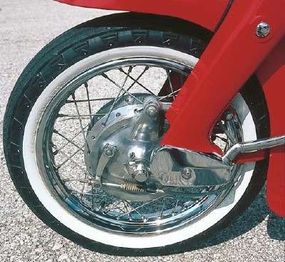 Stamped-steel forks were a signature of the 305.