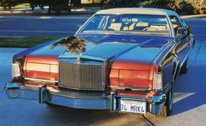 Among the styling cues from the Lincoln Continental Mark III  incorporated in the 1974 model were the hidden headlights.