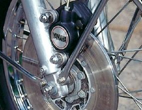 The speed potential of the RD350 made the front disc brake a welcome feature.