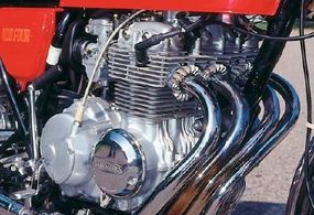 The CB400's 408-cc four-stroke four-cylinder wasquieter than rival Kawasaki's two-strokethree-cylinder engine.