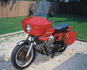 The 1976 Moto Guzzi V1000 Convert was distinguished by a torque converter that imparted some of the convenience of an automatic transmission. See more motorcycle pictures.