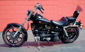 A two-inch extension of the front forks gives theFXB Sturgis a &quot;chopper&quot; look.