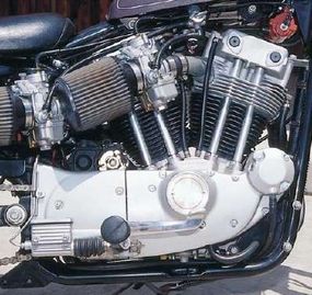 The XR's twin carbs on the right fed into the back of both cylinders.