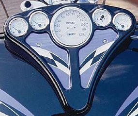 A nine-gallon gas tank supports a full set of gauges.
