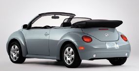 The base-model 2003 Volkswagen New Beetle convertible had a manual folding top. All other versions had power operation for the tight-sealing soft top.