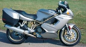 Ducati's desmodromic valvetrain helped the 1998 Ducati ST2 maintain a level of power and speed unusual in a touring bike. See more motorcycle pictures.