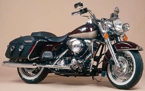 This 1998 Harley-Davidson FLHRCIRoad King Classic shows off Harley's maroonand gold anniversary colors. See more motorcycle pictures.
