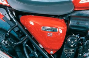 No mistaking this bike's nationality: Side covers weara badge along with the British Union Jack.