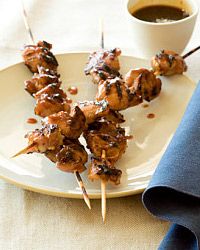 Brush chicken skewers with marinade before tossing them on the grill. You'll get a succulent, savory final product.
