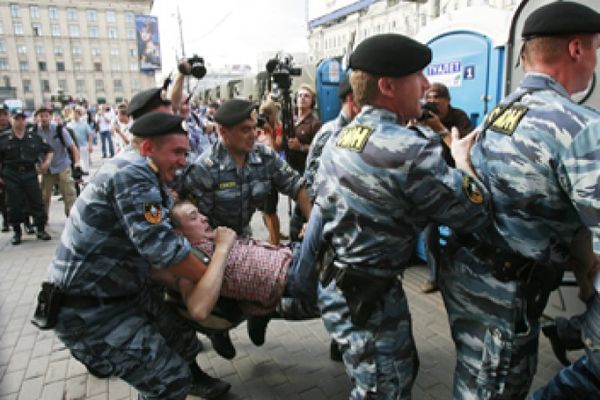 Armed police in military uniforms.