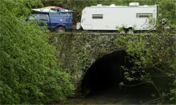 Car towing trailer