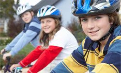 Three kids on bikes