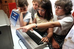The Commodore 64 never caught on in Europe or Asia the way it did in the U.S., but it still reached plenty of users. Here, German children try out a model in 1985.