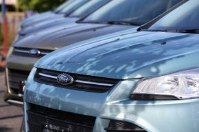 Brand new Ford Escape SUVs are displayed on the sales lot at Journey Ford on June 4, 2013, in Novato, California.