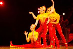 Acrobats from Cirque Du Soleil perform in the show 'OVO' at Carpa Santa Fe on October 29, 2011 in Mexico City, Mexico