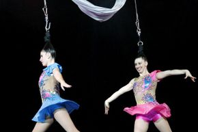 Two hair hanging performers.