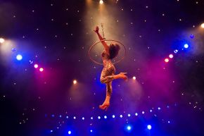 Hula hoop artist 'Marawa' performs during a photocall to promote the 'La Clique' Cabaret in London.