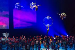 Cirque du soleil performs in the air and on the stage during the opening ceremony of the Toronto 2015 PanAm games.