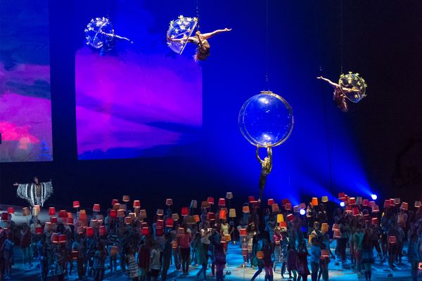 Cirque du soleil performs in the air and on the stage during the opening ceremony of the Toronto 2015 PanAm games.