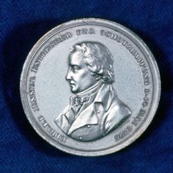 Edward Jenner, commemorated here on a coin, found that inoculating people with cowpox could build immunity to smallpox.