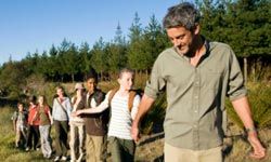 teacher takes students on a hike