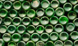 Put all those empty beer and soda bottles to good use -- recycle them into the walls of a new home!