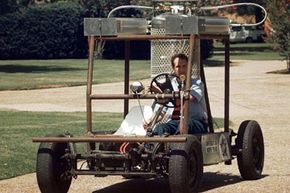 Dr. Carlos Ordonez takes the "CooLN2Car" for a spin across the campus of the University of North Texas in Denton, Texas, on Aug. 18, 1997. The car, a 1973 Volkswagen, runs on liquid nitrogen and has a top speed of 25 miles per hour.