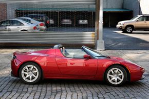 A Tesla Roadster electric car sits parked on a street in New York, on Feb. 19, 2009. Whatever the future holds for Tesla, the Roadster offers a glimpse of what's likely on the horizon for an auto industry that is increasingly going electric.