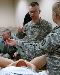 An Army OB/GYN instructs medics on delivering babies and emergencies that may arise during pregnancy.