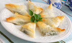Spanakopita is a savory bite your guests will love.