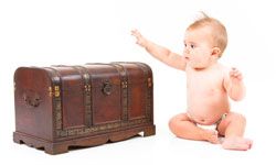 Treasure chest beside baby