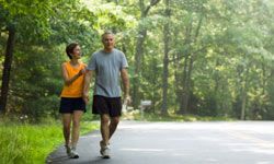 couple walking along road