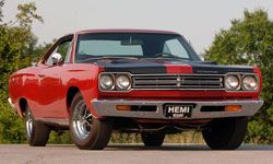 When the Plymouth Road Runner was first introduced in 1968, it had a base sticker price of only $3,000. Of course, this 1969 model likely had some added "muscle." See more [url='452595']pictures of classic muscle cars[/url].