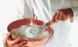 A whisk adds air into a meringue, making it light and fluffy.