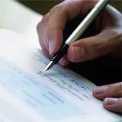 Person signing a form