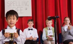 kids competing in a spelling bee