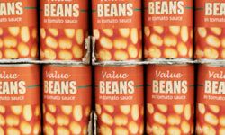 canned beans on grocery store shelf