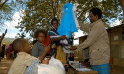 Women in the Babile district in eastern Ethiopia receive mosquito nets to help prevent malaria during the largest bed net distribution campaign in the history of Africa.