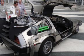 "Back to the Future" DeLoreans draw a crowd wherever they go.”border=