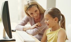 mom and daughter at computer