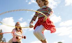 Kids playing hula-hoop