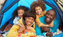 family camping in tent