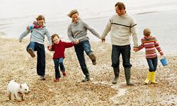 family walking on beach