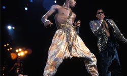 January 01 photo of MC HAMMER on stage wearing famous hammer pants