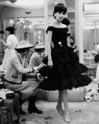 In 1927, French fashion designer Coco Chanel debuted a simple, elegant crepe de Chine black sheath that has become the "little black dress" millions of women the world over count as a wardrobe staple. Merci, Madame Chanel!”width=