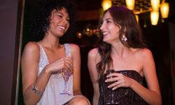 maid of honor and bride having a night out on the town together