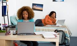 Young women hard at work studying