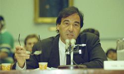 "JFK" director Oliver Stone testifies before a House subcommittee to seek the release of documents concerning President Kennedy's assassination.”border=