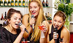 girls drinking and singing karaoke
